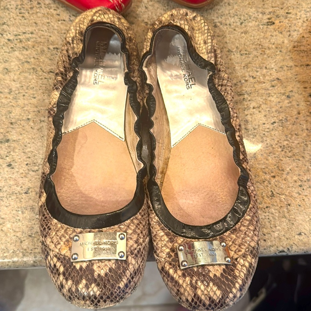 MK snakeskin flats